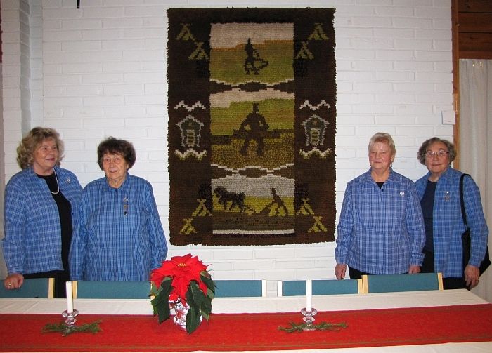 Maamiehen ryijy Kirkonkyl&auml;n seurakuntasalin sein&auml;ll&auml;